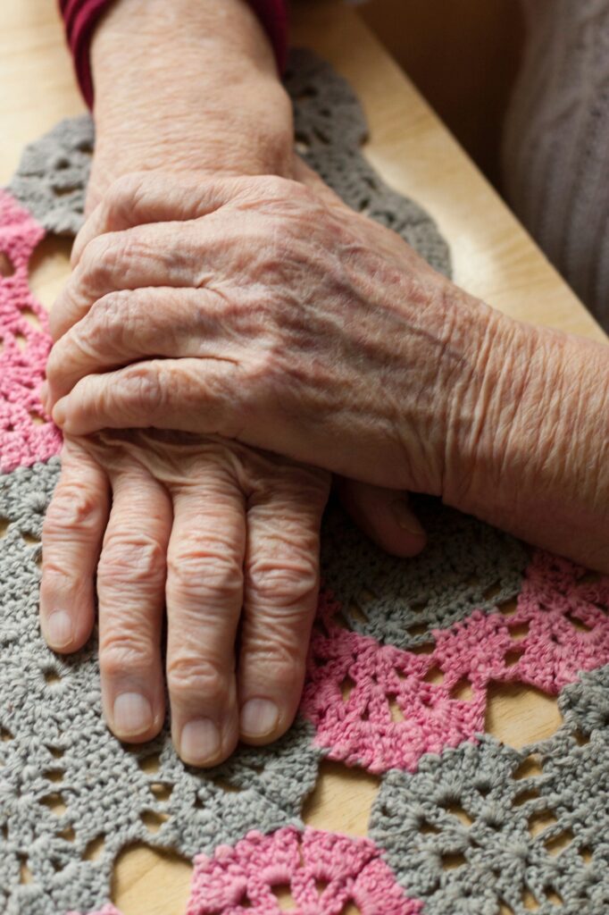 The hands of an elderly woman.